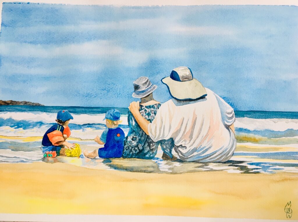 'Family Day Out', watercolour of a family with two young children sitting on a beach facing the sea